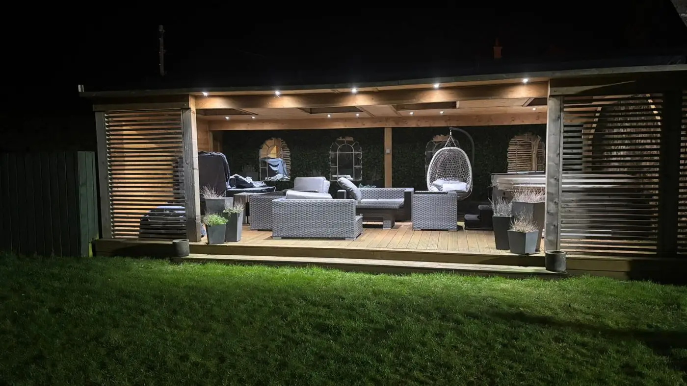 Garden room and decking, lit for the evenings